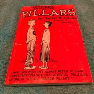 Book. Young Pillars. Charles M. Schulz. Creator of Peanuts.”